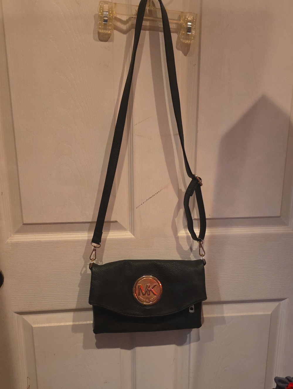 Michael Kors Black Crossbody Bag with Gold MK Medallion